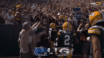Green Bay Packers Players On Football Field GIF