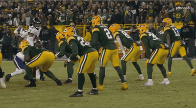 Green Bay Packers Players On Football Field GIF