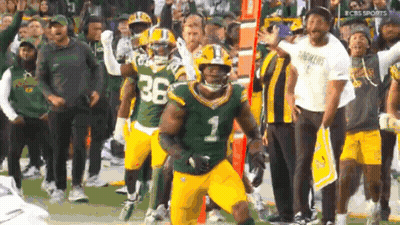 Green Bay Packers Players Running On Field GIF