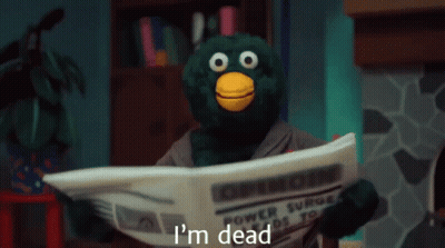 Green Bird Reading Newspaper I'm Dead GIF