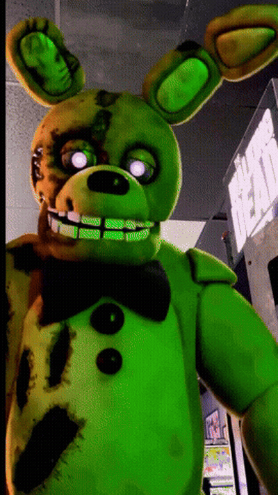 Green Bunny With Glowing Eyes Standing Before Dead Sign GIF