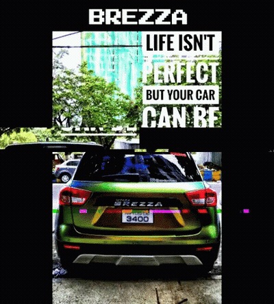 Green Car Parked In Front Of Brezza Life Sign GIF
