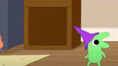 Green Cartoon Character In Purple Hat Standing On Wooden Floor GIF