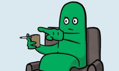 Green Cartoon Character Pointing GIF