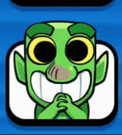 Green Cartoon Character With Big Eyes And Big Smile Sitting GIF