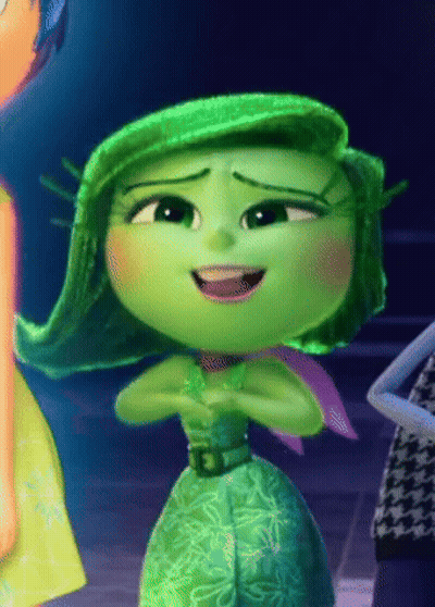 Green Cartoon Character With Purple Scarf Smiling GIF