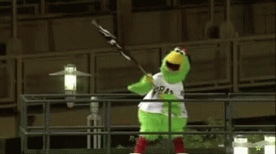 Green Chicken Mascot Holding Flag GIF