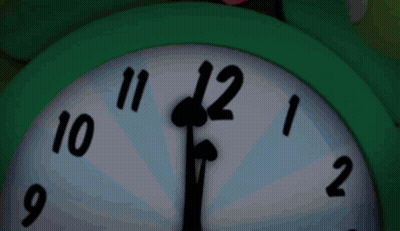 Green Clock Showing Almost Eleven GIF