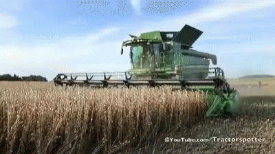 Green Combine Harvester In Field With YouTube.com GIF