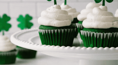 Green Cupcakes With White Frosting And Shamrocks GIF