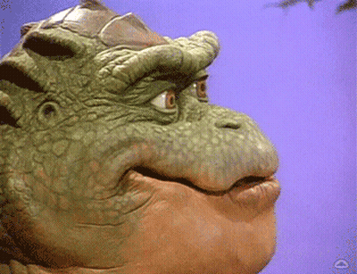 Green Dinosaur Face Purple Background GIF