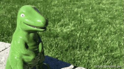 Green Dinosaur Figurine On Stone Wall GIF