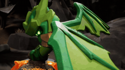 Green Dragon With Wings Standing On Rocks GIF