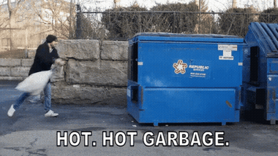 Green Dumpster With Lid Open On Pink Wall GIF