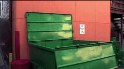 Green Dumpster With No Loading Sign GIF