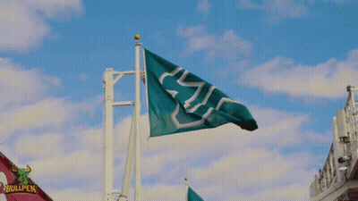 Green Flag With White U GIF
