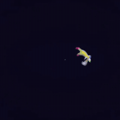 Green Frog With Purple Eyes And Pink Cheeks Holding Hands Behind Head GIF