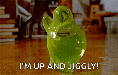 Green Ghost Standing On Wooden Floor GIF