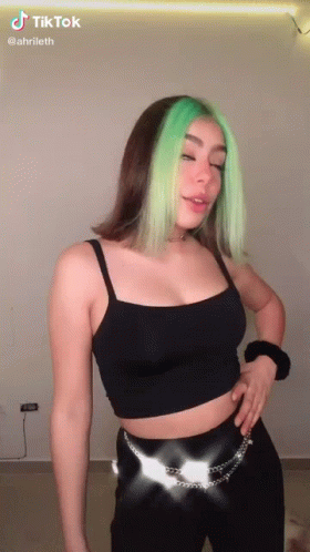 Green Hair Woman Wearing Black Crop Top Pants