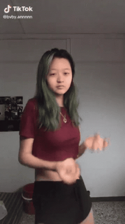Green Haired Dancing Girl Red Shirt Black Shorts GIF