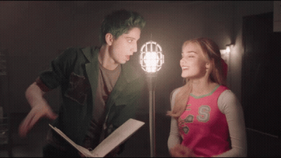 Green-Haired Man And Pink-Shirt Woman With Letter S GIF
