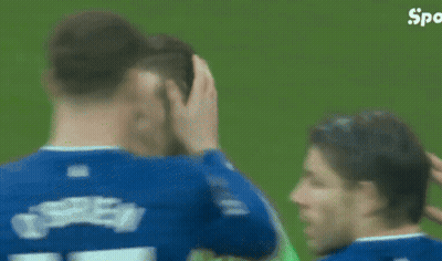 Green Jersey Soccer Player Screaming Near Another Player GIF
