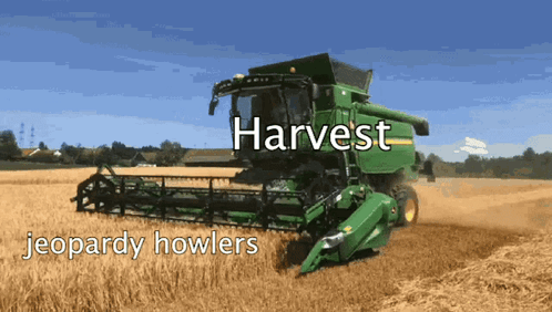 Green John Deere Combine Harvester In Wheat Field GIF