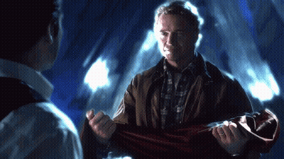 Green Lego Holding Gun In Purple Shirt Hat GIF