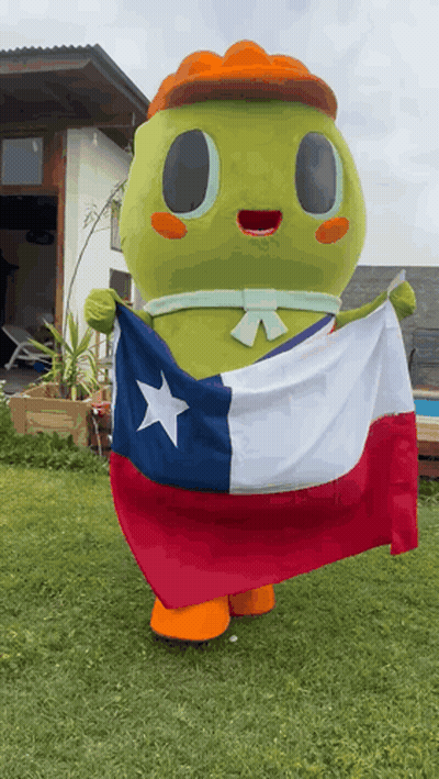 Green Mascot Holding Texas Flag GIF