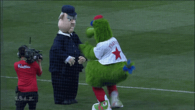Green Mascot With Red Star GIF
