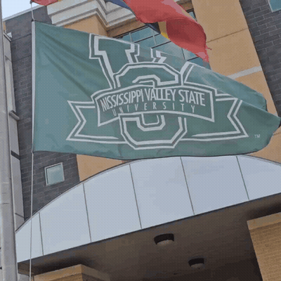 Green Mississippi Valley State University Flag Hanging From Pole GIF