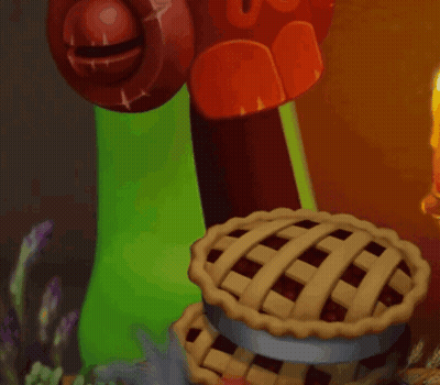 Green Monster Holding Pie Next To Candle GIF