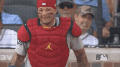 Green Monster Mascot Sitting In Stands GIF