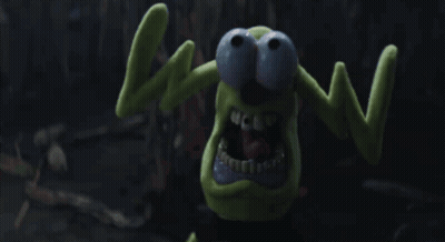 Green Monster With Blue Eyes Making Wow Sign GIF