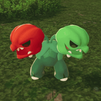 Green Monster With Red Head In Grassy Field GIF