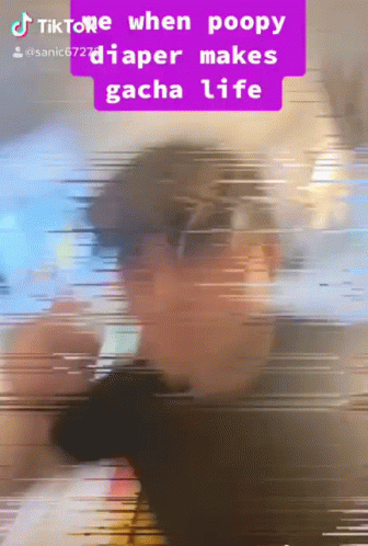 Green Pig With Pink Nose Looking At Camera GIF