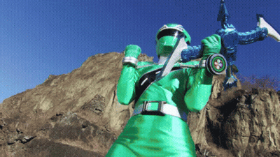 Green Power Ranger Holding Sword And Shield GIF
