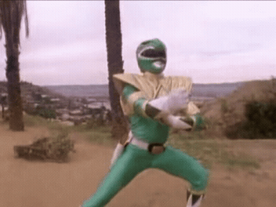 Green Ranger From Power Rangers Standing In Dirt GIF