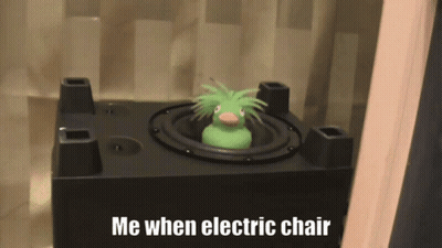 Green Rubber Duck In Speaker Saying Me When Electric Chair GIF