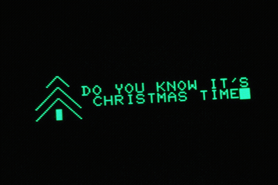 Green Sign Saying Do You Know It's Christmas Time GIF