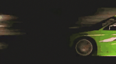 Green Sports Car Driving At Night GIF