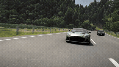 Green Sports Car Driving Down Road GIF