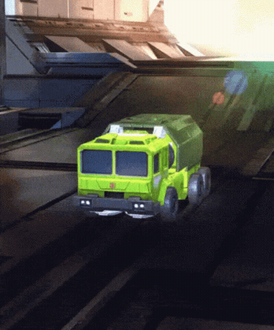 Green Truck With Transformer Logo Driving GIF