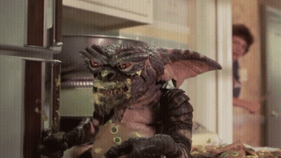 Gremlin Eating Cheese GIF
