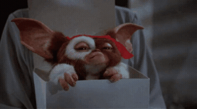 Gremlin Peeking Over Box GIF