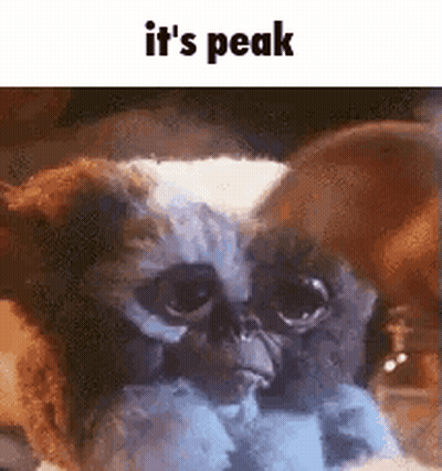 Gremlin Toy With Sharp Claws And Red Eyes GIF