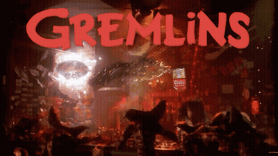 Gremlins Movie Poster Gremlin In Dark Room GIF