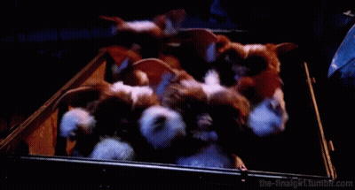 Gremlins Movie Poster Gremlin In Dark Room GIF