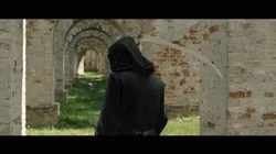 Grim Reaper Holding Scythe Turning Around GIF