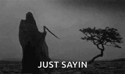 Grim Reaper In Desert With Scythe GIF